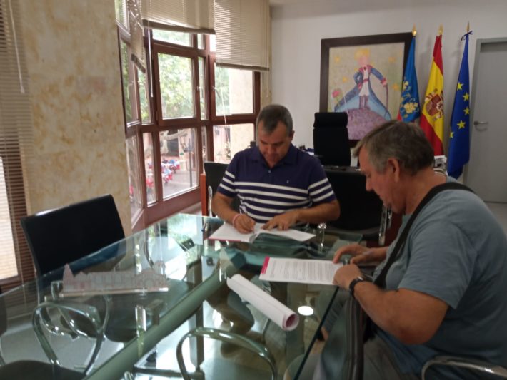 173.- fotonota convenio Aspis