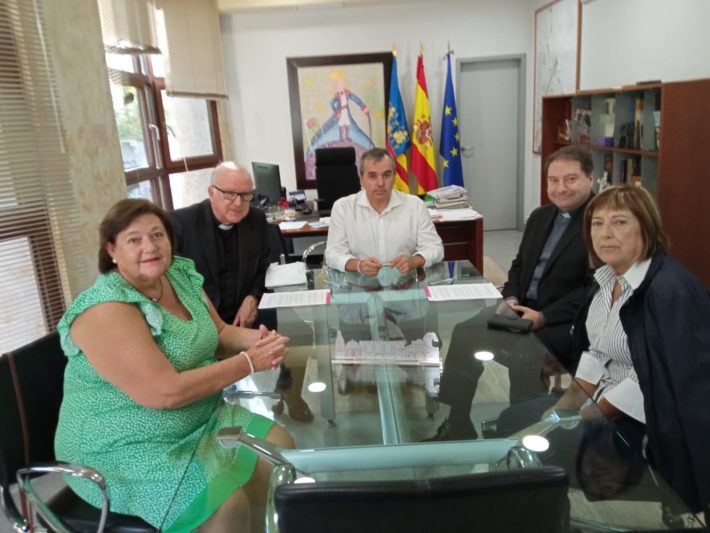 197.- FOTONOTA firma caritas